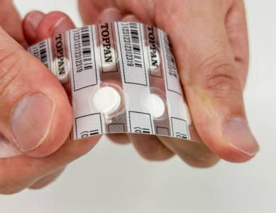 Samples of push-through blister packs with brittle lidding material